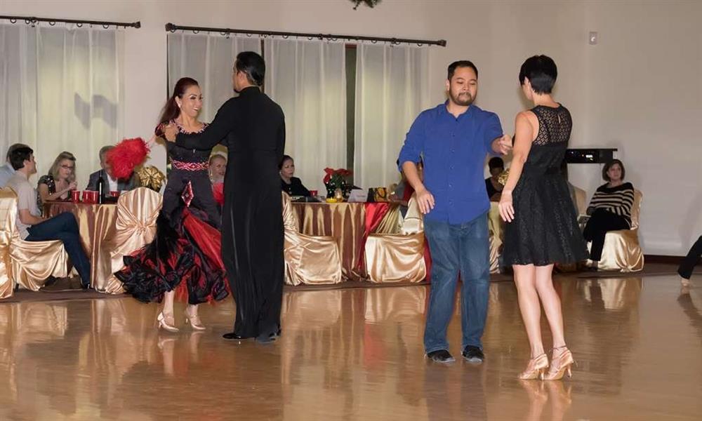 Social dancing at Holiday Dance Showcase in Houston at DanceSport Club